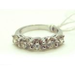 A Large 18ct White Gold Five Stone Diamond Ring, claw set throughout with uniform brilliant cut