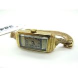A 9ct Gold Cased Art Deco Style Ladies Wristwatch, the rectangular dial with black Arabic
