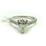 A Modern 18ct White Gold Pear Shape Single Stone Diamond Ring, high claw set to the centre between