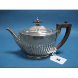 A Hallmarked Silver Bachelor's Tea Pot, JR, Sheffield 1897, of oval semi reeded form, 275grams.