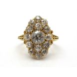 A Large Late Victorian 18ct Gold Diamond Set Cluster Ring, set throughout with graduated old cut