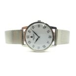 Universal Geneve; A c.1960's Wristwatch, the signed white dial with Chinese numerals, within plain
