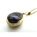 A Modern 9ct Gold Blue John Pendant, bearing feature hallmarks, on a 9ct gold chain.