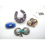 An Amethyst Set Horseshoe Brooch, graduated set (lacking highlights); An Edwardian Openwork