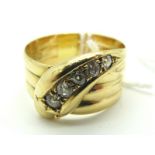 An 18ct Gold Diamond Set Serpent Ring, of wide coiled design, the head graduated set with old cut