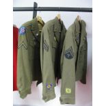 Three American Post WWII/Vietnam Period Khaki Tunics/Battles Dress, with unit badges/medal ribbons/
