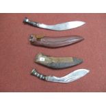 Two Mid XX Century Kukri, one with skinning knives in leather covered scabbard, one in poor