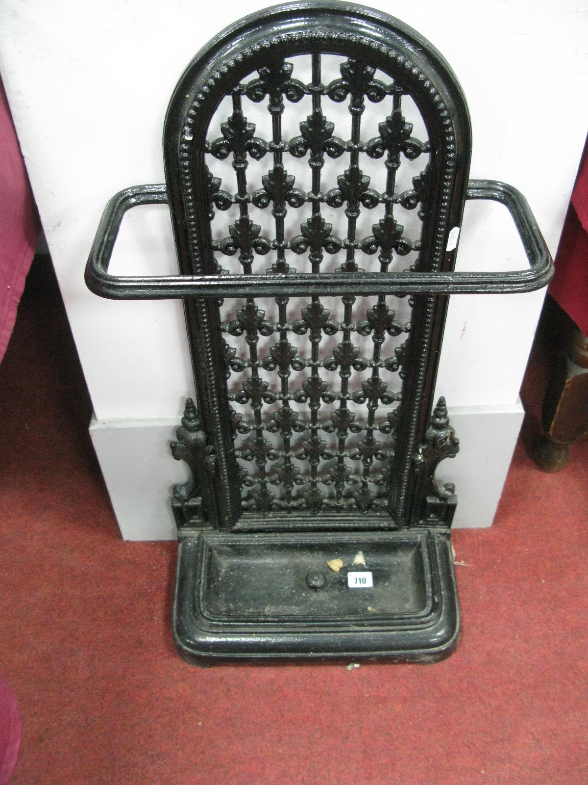 A XIX Century Black Painted Cast Iron Stick/Stand, with drip tray.