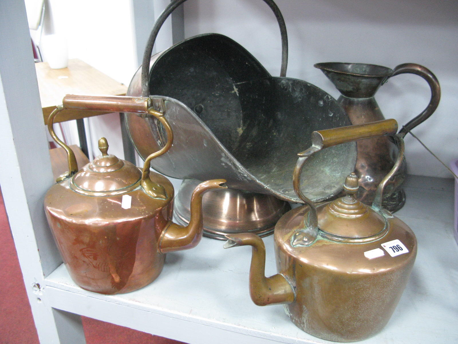 XIX Century Copper Coat Helmet, jug and two kettles.