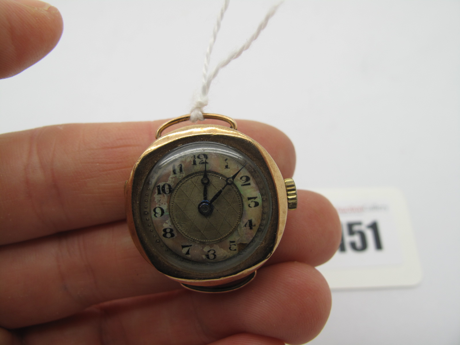 A Ladies Wristwatch Head Only, the unsigned dial with Arabic numerals, within plain case, stamped "9