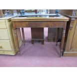 A XIX Century Mahogany Fold Over Tea Table, with curved corners and turned legs, 88cm wide.