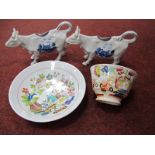 Pair of Blue and White China Cow Creamers, each featuring cottage scene, 15.5cm long, XIX Century
