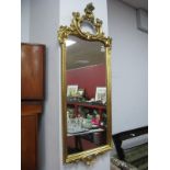 XX Century Gilt Pier Glass, with 'C' scroll and foliate decoration, 127 cms high.