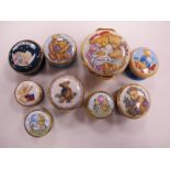Nine Circular Enamel Trinket Boxes, by Crummles, Halcyon Days and Staffordshire Enamels, all painted