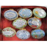 Eight Staffordshire Enamels Oval Trinket Boxes, each painted and with romantic verse, all 5.3cm