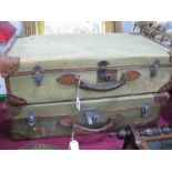 Pair of Hessian Travel Trunks, having leather corner mounts and handles.