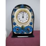 A Moorcroft Pottery Clock, painted in the Rennie Rose' (blue) pattern, designed by Rachel Bishop,