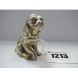 A Miniature Hallmarked Silver Model of a Dog, seated, of textured finish, Sheffield 1977, 5.3cm