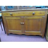 A XIX Century Pine Cabinet, with one long drawer, over twin panelled cupboard doors, shaped apron,