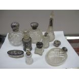 A Collection of Assorted Hallmarked Silver Topped Glass Dressing Table Jars, scent bottles, a plated