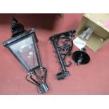 A Black Painted Outdoor Lamp, in the form of a XIX Century gas lamp, with a wall mounting bracket.