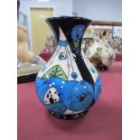 A Moorcroft Pottery Vase, painted in the 'Rennie Rose' (blue) pattern, designed by Rachel Bishop,
