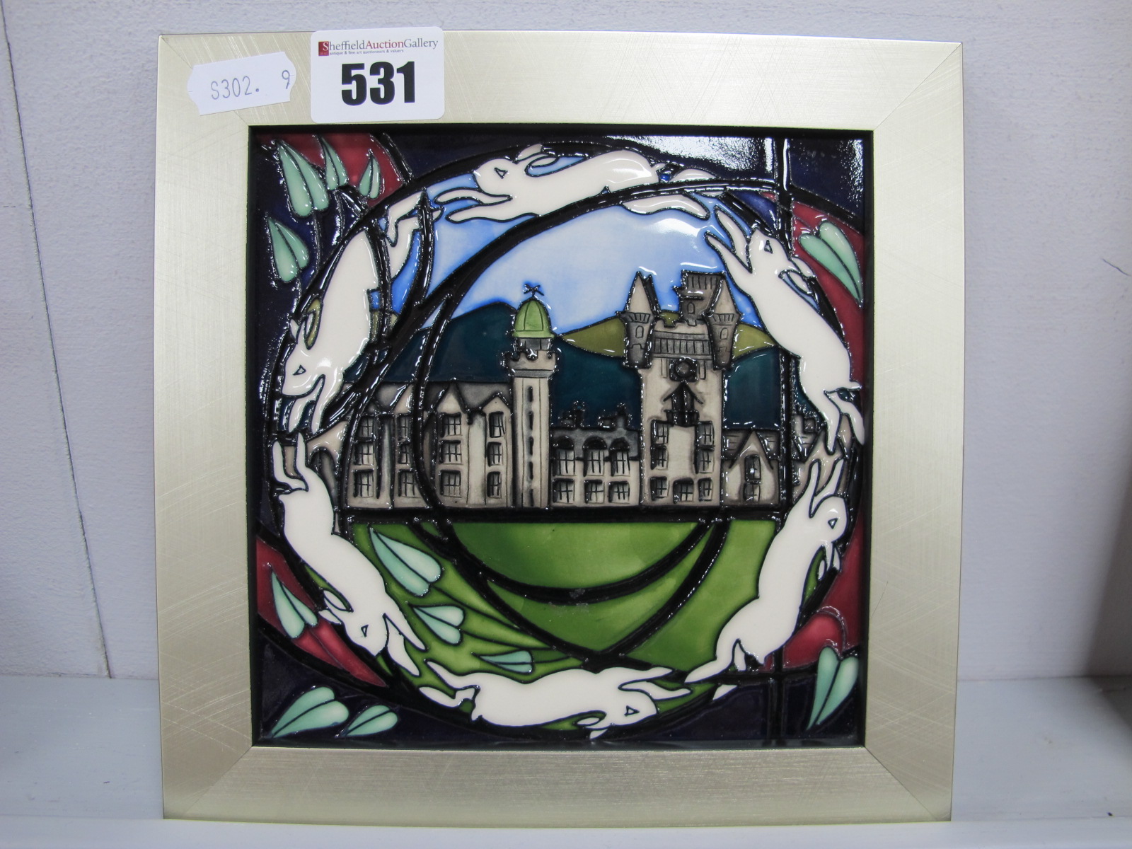 A Moorcroft Pottery Square Plaque, painted in the 'Balmoral' pattern, designed by Vicky Lovatt,