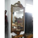 XX Century Walnut Pier Glass, a arched top, with shell decoration, base of mirror with a brushing