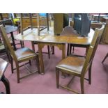 1920's Oak Drop Leaf Table, on reeded legs; together with five oak dining chairs, with rail
