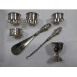 A Pair of Hallmarked Silver Napkin Rings, leaf engraved and initialled; a hallmarked silver egg cup,