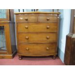 XIX Century Mahogany Bow Front Chest, of two short and three long drawers, having turned handles,