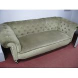 A XIX Century Chesterfield Settee, on turned feet, pot castors, 200 x 65cm high.