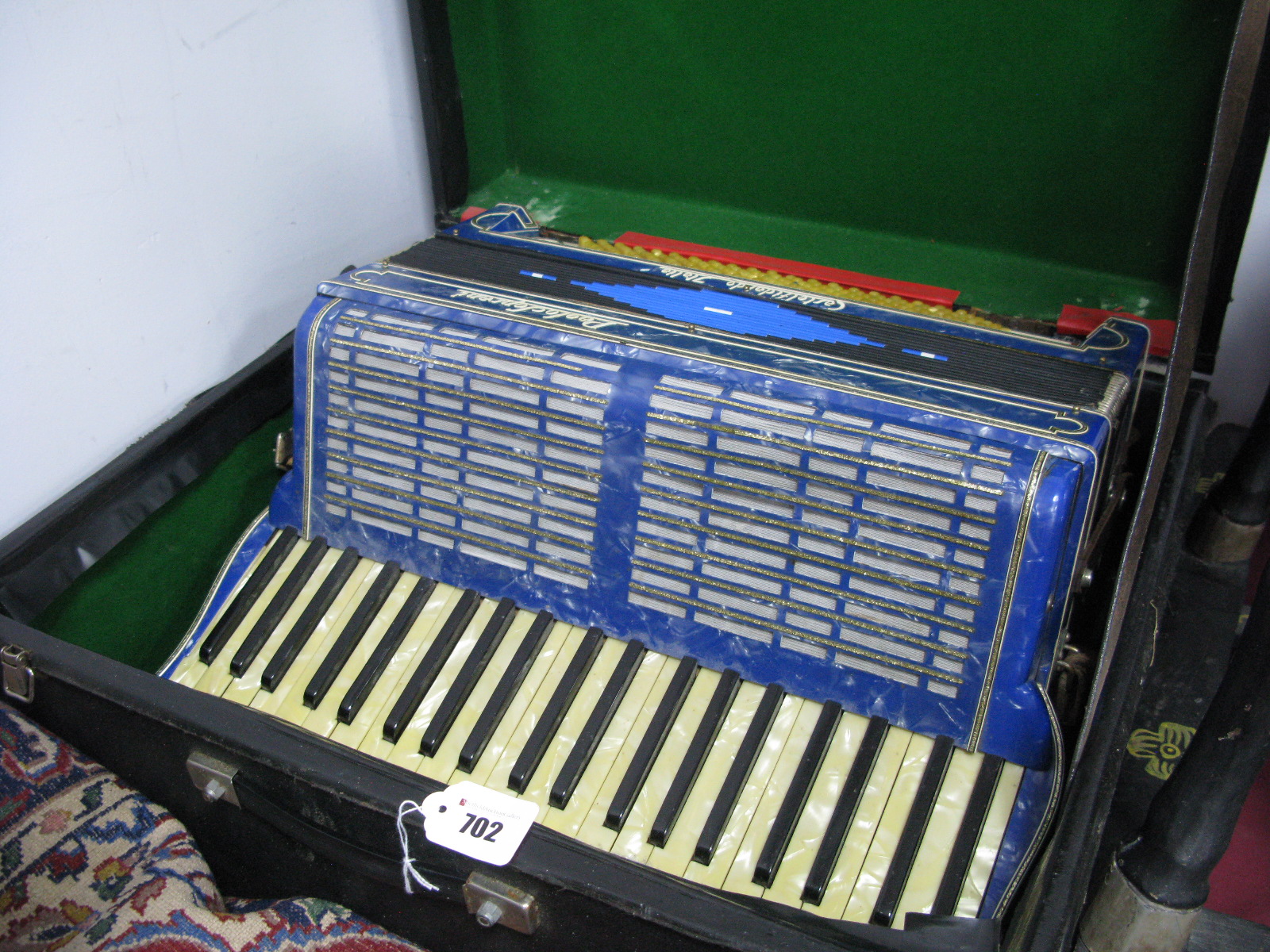 Paolo Soprani Castelfidardo Italia Accordion, with blue marbelette casing, in black carry case.