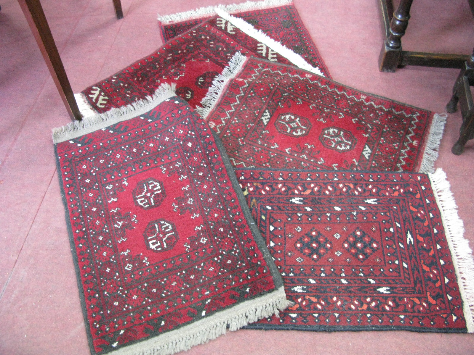 Five Islamic Woolwork Prayer Rugs, with tassel ends.