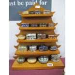 Twenty Miniature Collectors Cloisonné Trinket Boxes, on a pagoda shaped wooden display stand.