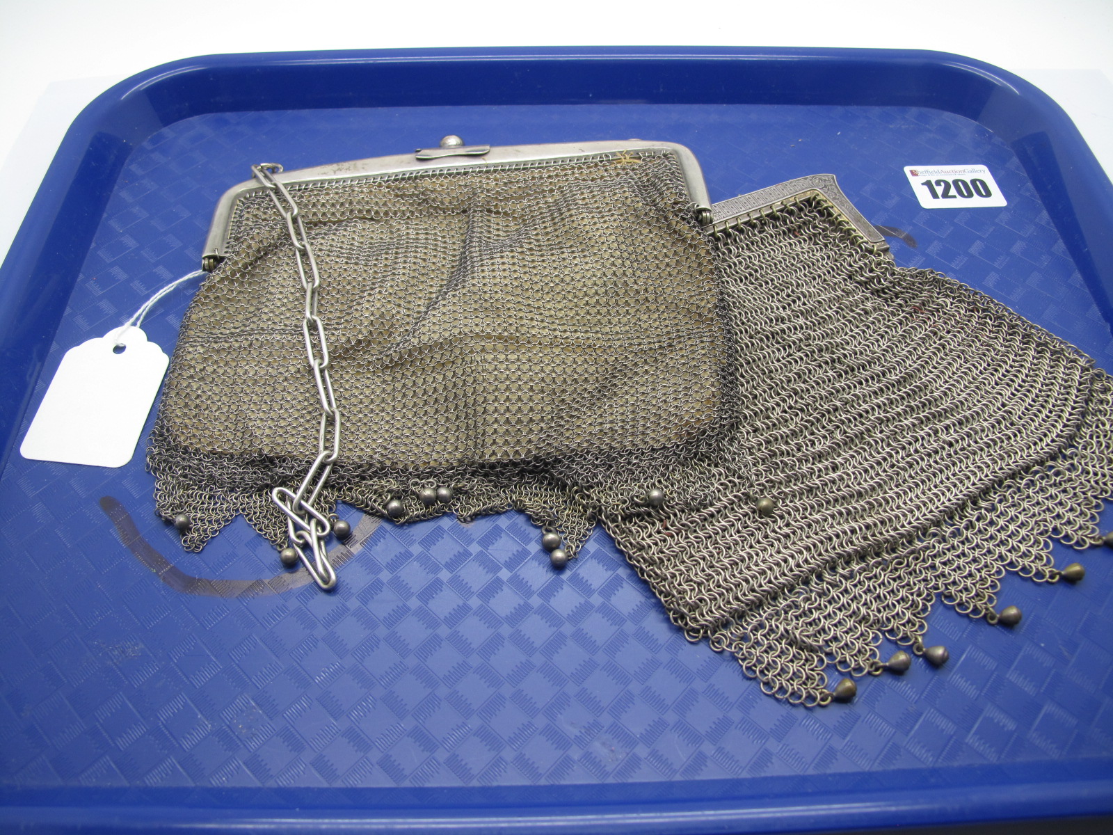 A Mesh Link Ladies evening Bag, with chain link handle; together with another, with foliate