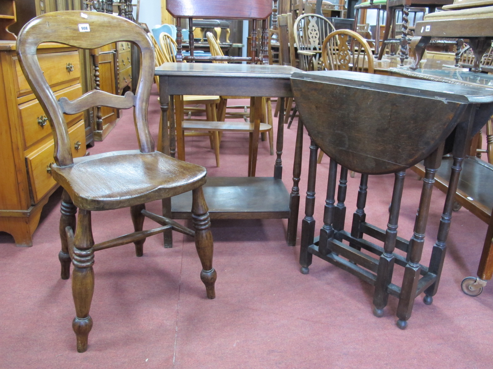 Early XX Century Oak Drop Leaf Table, on turned and block supports; together with an oak two tier