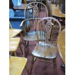 A Set of XX Century Four Ash Elm Wheel Back Chairs, with a hooped back, rail supports on turned