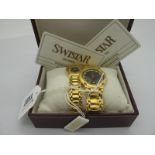 Swistar Matching Ladies and Gent's Wristwatches, in original box.