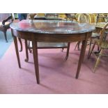 A XIX Century Mahogany Demi Lune Table, with carved border on tapering block support, 125cm wide.