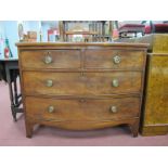 A XIX Century Mahogany Bow Fronted Chest of Drawers, with small drawers, two long on bracket feet.