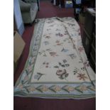 A Large Heavy Woven Throw, with flowers on a dark cream ground and floral border.