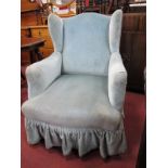 Early XX Century Wing Armchair, in pale blue velvet, on mahogany cabriole legs.