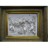 A Continental Style Wall Plaque, of cherubs in a gilt frame.