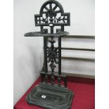 A XIX Century Black Painted Cast Iron Stick/Umbrella Stand, with drip tray.