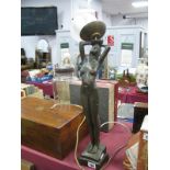 Art Deco Style Table Lamp, as a nude lady, arms aloft holding glass shade.