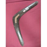 A Boomerang, in hardwood, having 9ct gold presentation mount "Sydney 20.9.28", 49cm wide.