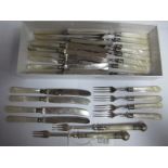 A Set of Twelve Mother of Pearl Handled Fruit/Dessert Knives and Forks, blades stamped "WH&SA"; A