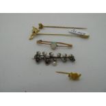 A Victorian Style Bar Brooch, of open work design, pearl set, with stone set highlights, a