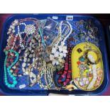 A Selection of Costume Jewellery, including various bead necklaces, ornate floral necklaces, etc,